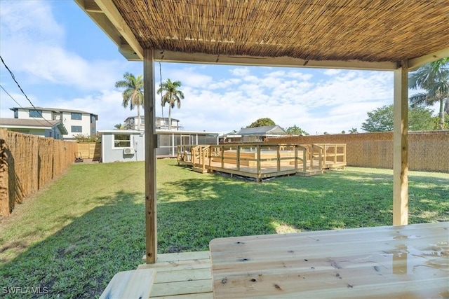 3064 Connecticut Ave, Naples, FL 34112 - fenced backyard with a deck and a shed