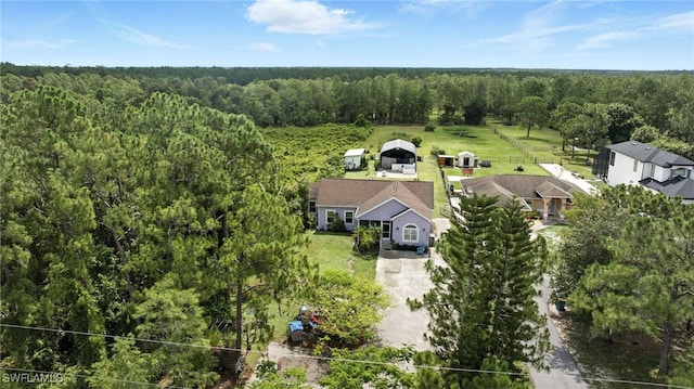4440 40th St NE, Naples, FL 34120 - aerial view of property and surrounding area with a forest