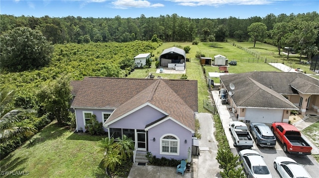 4440 40th St NE, Naples, FL 34120 - view of subject property with a forest