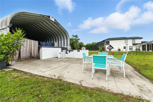 4440 40th St NE, Naples, FL 34120 - view of patio / terrace with a detached carport and outdoor dining space
