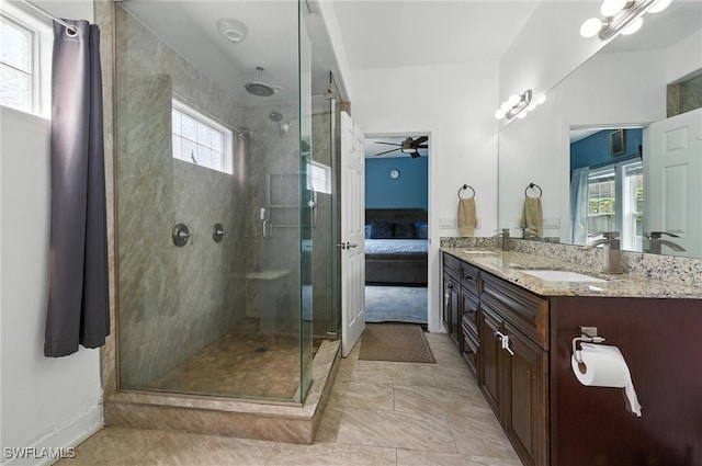 4440 40th St NE, Naples, FL 34120 - ensuite bathroom with a shower stall, double vanity, and ceiling fan