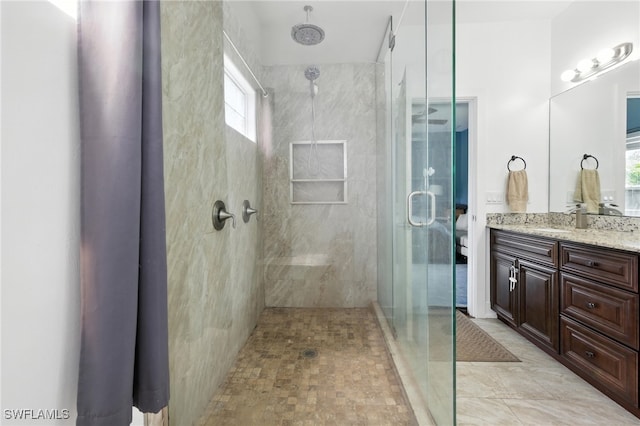 4440 40th St NE, Naples, FL 34120 - bathroom with a stall shower and vanity