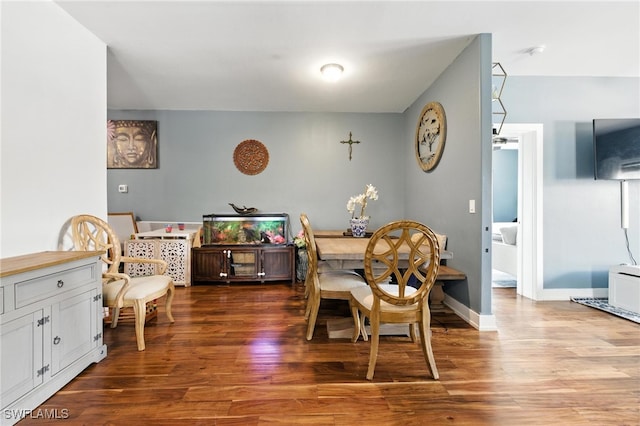 4440 40th St NE, Naples, FL 34120 - dining space with wood finished floors and baseboards