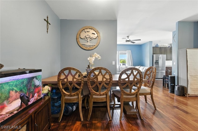 4440 40th St NE, Naples, FL 34120 - dining room featuring wood finished floors and a ceiling fan