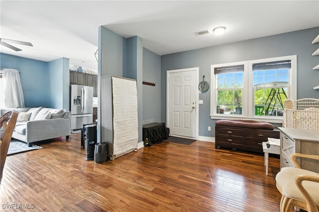 4440 40th St NE, Naples, FL 34120 - foyer entrance featuring ceiling fan and wood finished floors