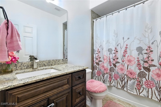 4440 40th St NE, Naples, FL 34120 - bathroom featuring vanity, a shower with shower curtain, and tile patterned floors