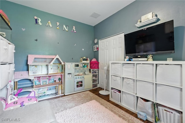 4440 40th St NE, Naples, FL 34120 - rec room featuring wood finished floors