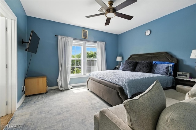 4440 40th St NE, Naples, FL 34120 - bedroom with carpet floors and ceiling fan