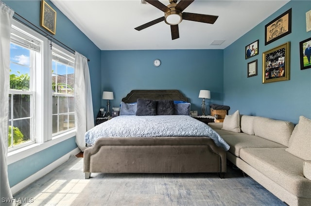 4440 40th St NE, Naples, FL 34120 - bedroom with wood finished floors and ceiling fan