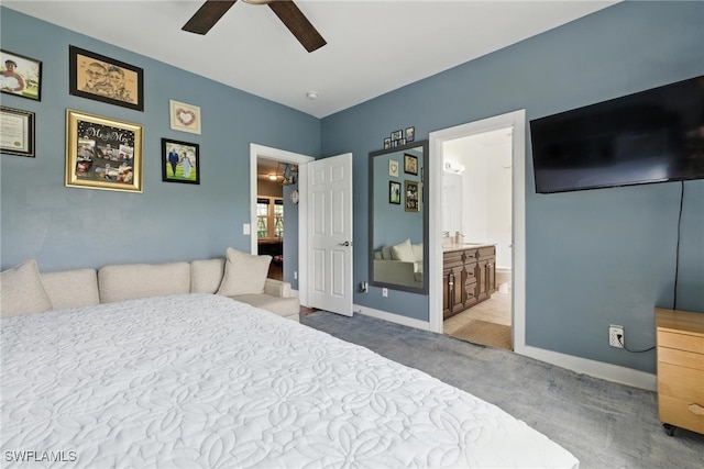 4440 40th St NE, Naples, FL 34120 - carpeted bedroom featuring ceiling fan and connected bathroom