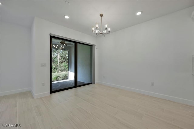 4184 Sonoma Oaks Cir, Naples, FL 34119 - empty room with a chandelier and recessed lighting
