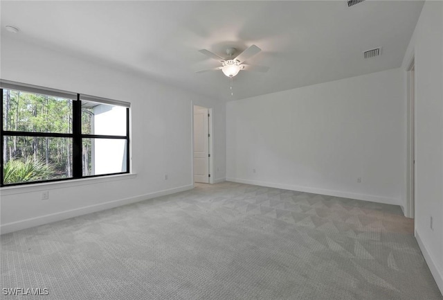 4184 Sonoma Oaks Cir, Naples, FL 34119 - unfurnished room featuring light carpet and ceiling fan