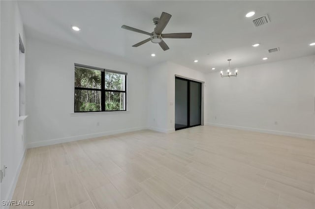 4184 Sonoma Oaks Cir, Naples, FL 34119 - unfurnished room featuring a chandelier, recessed lighting, ceiling fan, and light wood finished floors