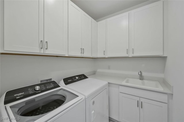 4184 Sonoma Oaks Cir, Naples, FL 34119 - washroom with cabinet space and independent washer and dryer
