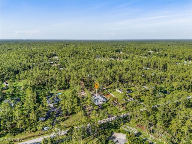 2717 10th Ave SE, Naples, FL 34117 - aerial overview of property's location featuring a heavily wooded area