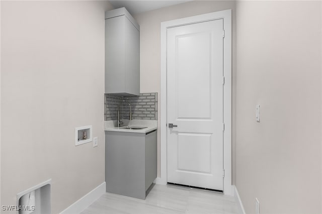 2717 10th Ave SE, Naples, FL 34117 - washroom featuring cabinet space and washer hookup