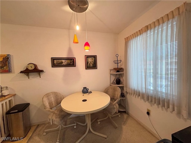 13150 Kings Point Dr Unit 11C, Fort Myers, FL 33919 - dining room featuring vaulted ceiling and light carpet