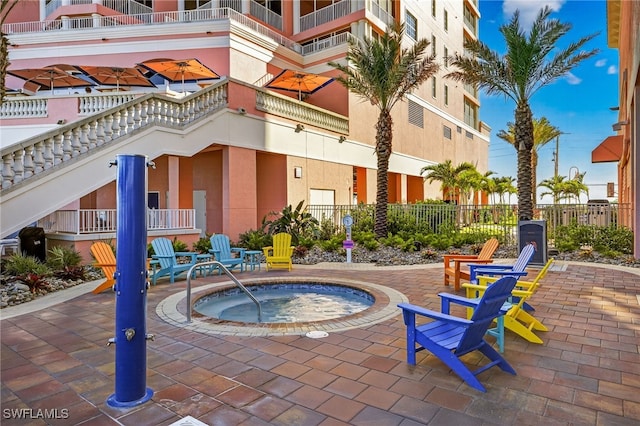 140 Estero Blvd Unit 2209, Fort Myers Beach, FL 33931 - view of swimming pool with a hot tub