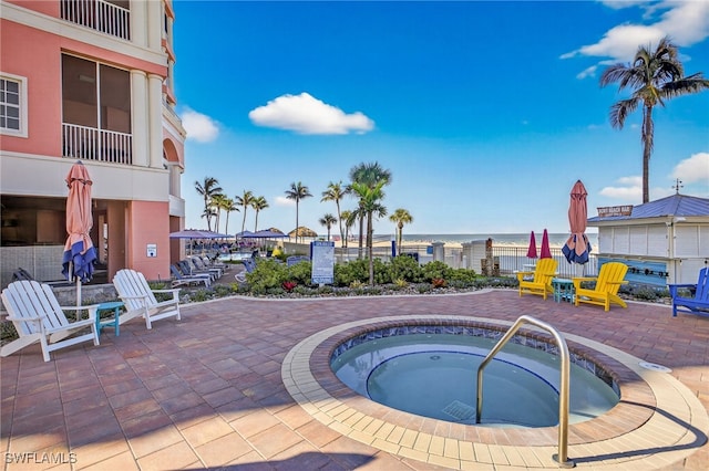 140 Estero Blvd Unit 2209, Fort Myers Beach, FL 33931 - view of pool featuring a community hot tub and a patio
