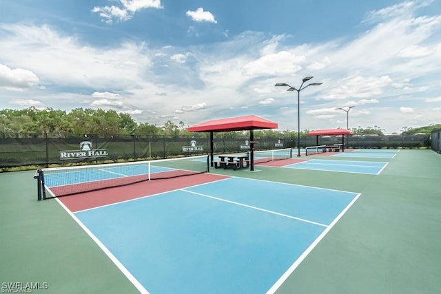 3943 E Hampton Cir, Alva, FL 33920 - view of tennis court featuring community basketball court