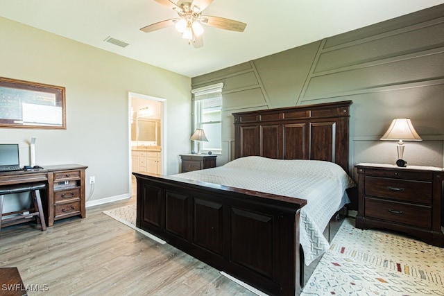 3943 E Hampton Cir, Alva, FL 33920 - bedroom featuring light wood-style flooring, ceiling fan, and ensuite bathroom