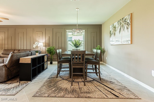 3943 E Hampton Cir, Alva, FL 33920 - dining room with light tile patterned flooring, a ceiling fan, and a chandelier