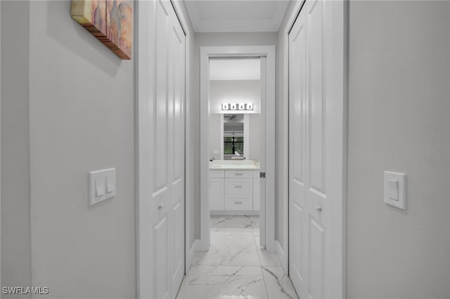 4267 4th Ave SE, Naples, FL 34117 - hallway featuring light marble finish floors and baseboards
