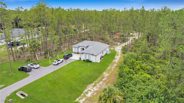 4267 4th Ave SE, Naples, FL 34117 - view of subject property featuring a forest