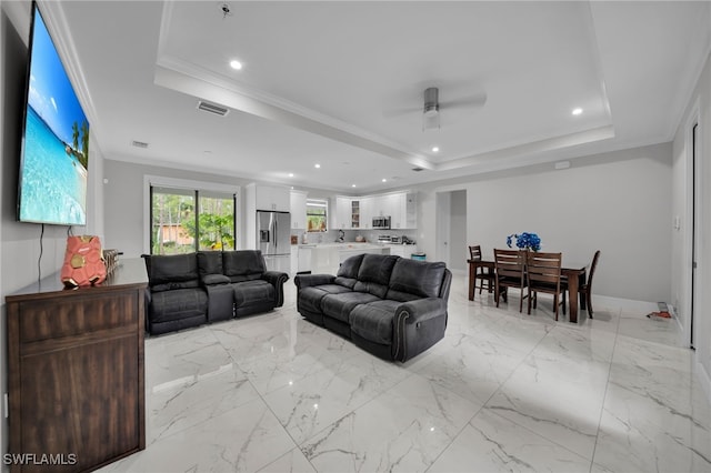 4267 4th Ave SE, Naples, FL 34117 - living area featuring a tray ceiling, a ceiling fan, crown molding, and recessed lighting