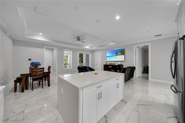 4267 4th Ave SE, Naples, FL 34117 - kitchen featuring freestanding refrigerator, a raised ceiling, open floor plan, recessed lighting, and ceiling fan