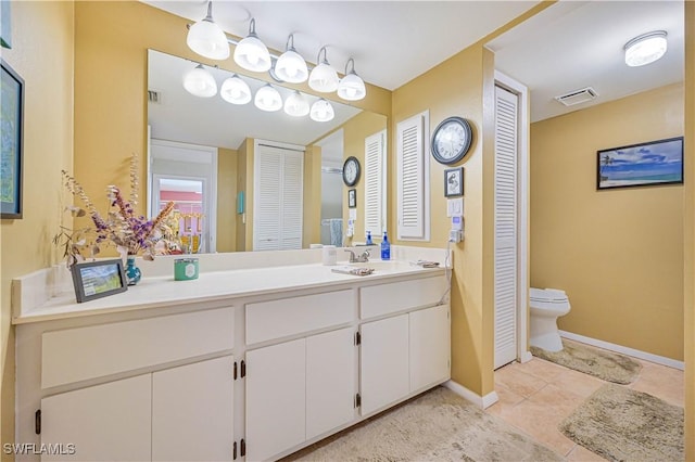 6296 Sugar Bush Ln Unit A, Fort Myers, FL 33908 - bathroom featuring a closet, vanity, and tile patterned flooring