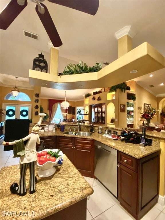 291 Everglades Blvd N, Naples, FL 34120 - kitchen with dishwasher, light tile patterned floors, light stone countertops, a ceiling fan, and a towering ceiling