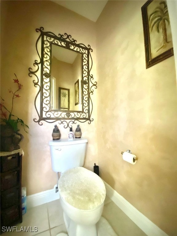 291 Everglades Blvd N, Naples, FL 34120 - half bathroom featuring tile patterned floors and toilet