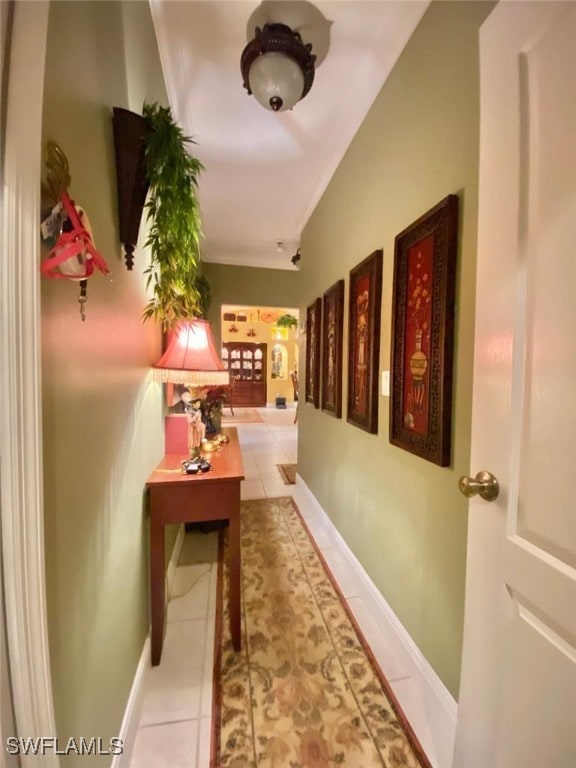 291 Everglades Blvd N, Naples, FL 34120 - hall featuring light tile patterned flooring and lofted ceiling
