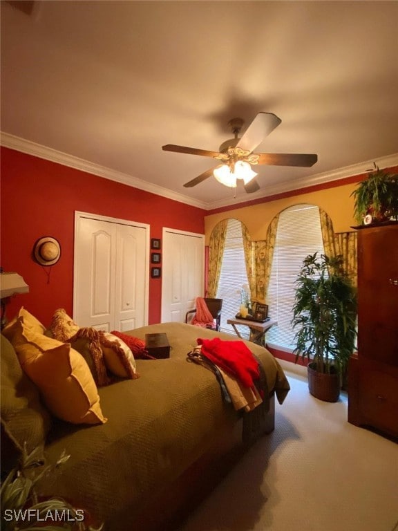 291 Everglades Blvd N, Naples, FL 34120 - carpeted bedroom with multiple closets, crown molding, and ceiling fan