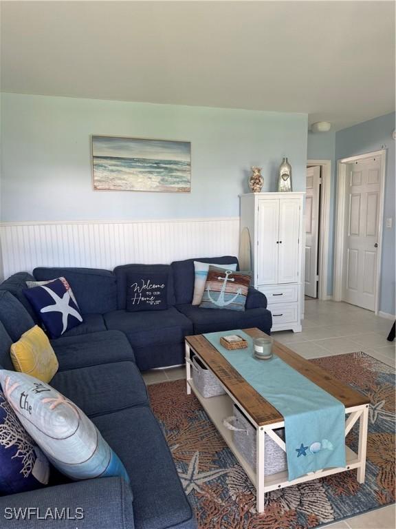 190 N Collier Blvd Unit O4, Marco Island, FL 34145 - living room featuring light tile patterned flooring
