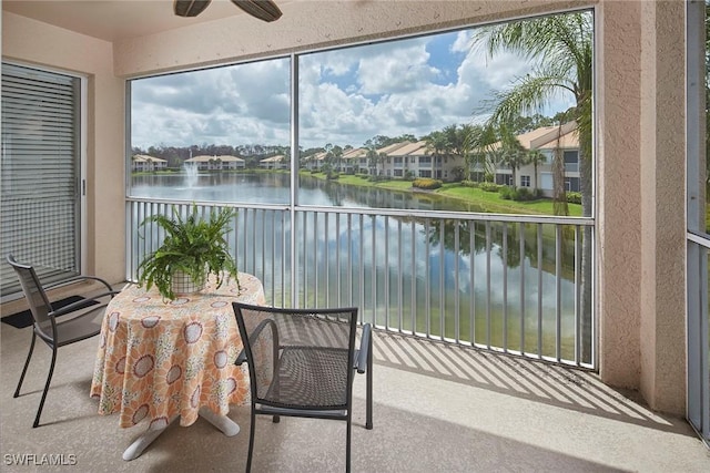 6275 Wilshire Pines Cir Unit 1008, Naples, FL 34109 - sunroom / solarium with a water view and a residential view