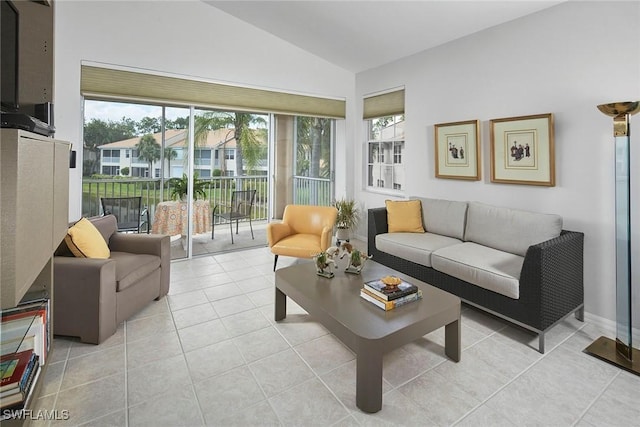 6275 Wilshire Pines Cir Unit 1008, Naples, FL 34109 - living area with vaulted ceiling and light tile patterned floors