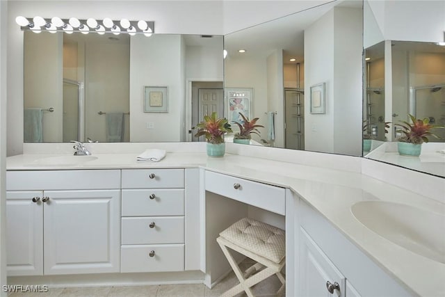 6275 Wilshire Pines Cir Unit 1008, Naples, FL 34109 - bathroom with vanity, a shower with door, tile patterned flooring, and recessed lighting