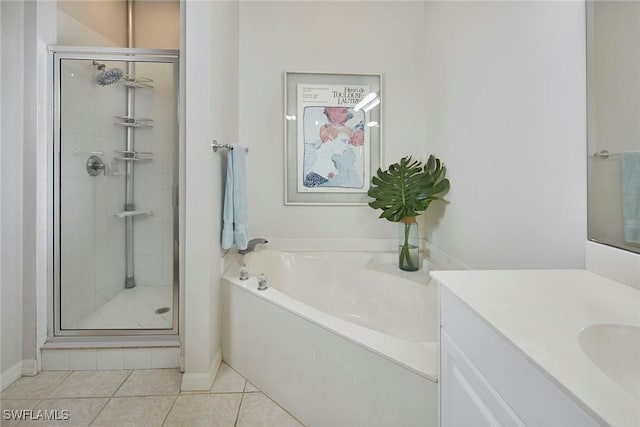 6275 Wilshire Pines Cir Unit 1008, Naples, FL 34109 - full bathroom with a garden tub, a stall shower, tile patterned flooring, and vanity