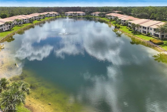 6275 Wilshire Pines Cir Unit 1008, Naples, FL 34109 - aerial perspective of suburban area with a large body of water