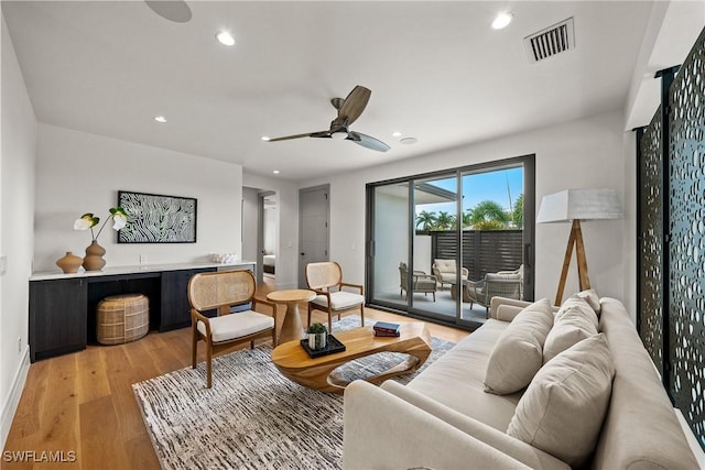 1261 13th Ave N, Naples, FL 34102 - living room featuring light wood-style flooring, recessed lighting, and ceiling fan