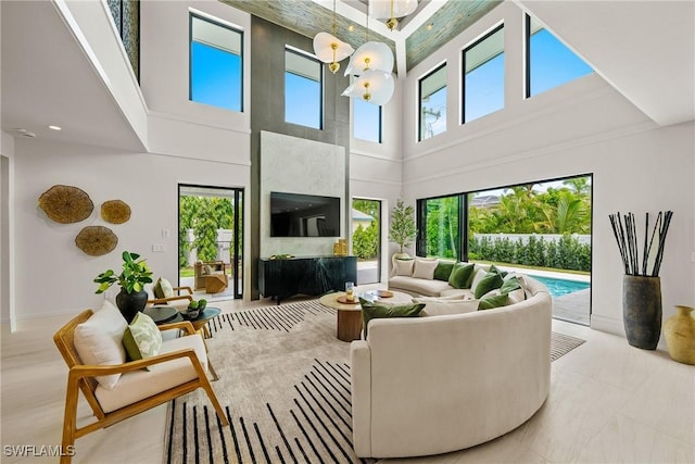 1261 13th Ave N, Naples, FL 34102 - living room featuring a towering ceiling