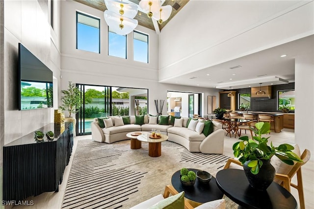 1261 13th Ave N, Naples, FL 34102 - living area with a high ceiling and recessed lighting