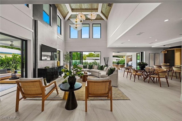 1261 13th Ave N, Naples, FL 34102 - building lobby featuring high vaulted ceiling and beamed ceiling