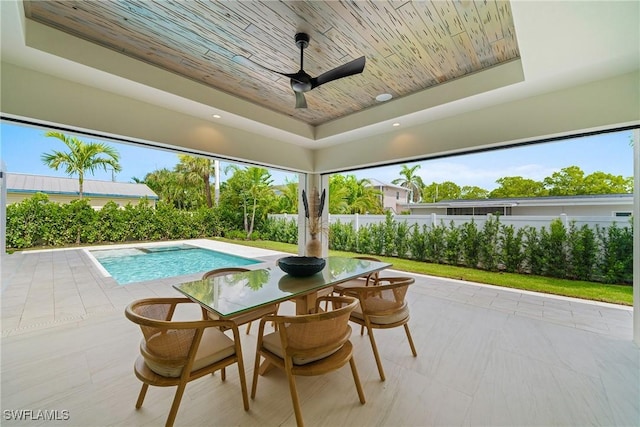 1261 13th Ave N, Naples, FL 34102 - view of pool featuring a patio area, a ceiling fan, and outdoor dining area