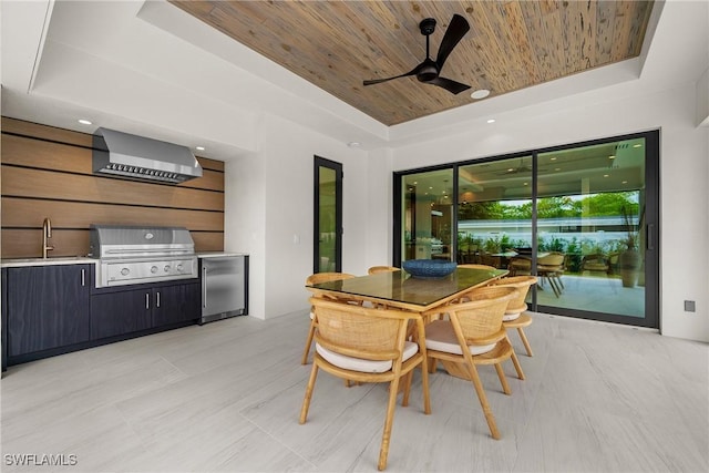 1261 13th Ave N, Naples, FL 34102 - dining space featuring a raised ceiling, wood ceiling, and a ceiling fan