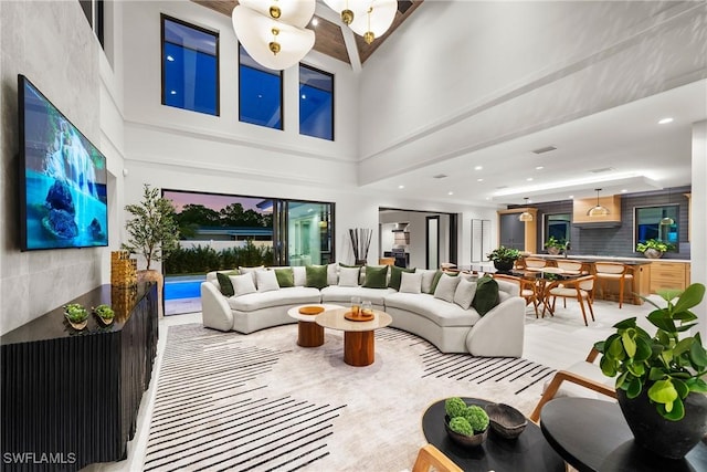 1261 13th Ave N, Naples, FL 34102 - living area with a high ceiling and recessed lighting