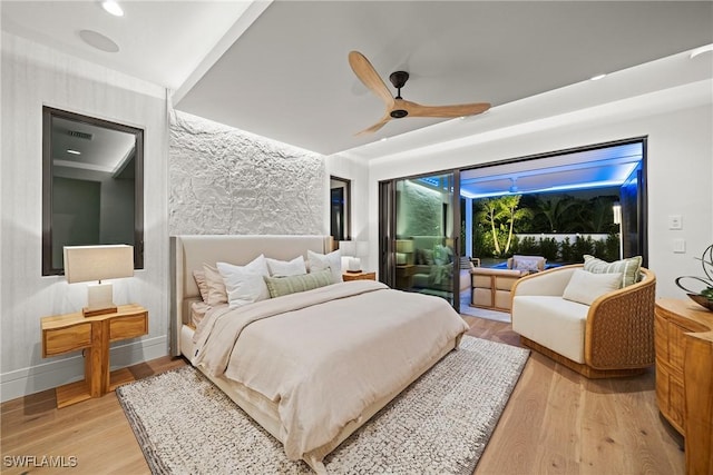 1261 13th Ave N, Naples, FL 34102 - bedroom with light wood-type flooring and ceiling fan