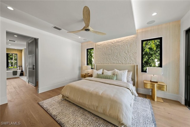 1261 13th Ave N, Naples, FL 34102 - bedroom with light wood-style flooring, recessed lighting, and a ceiling fan